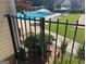 This crystal-clear community pool includes lounge chairs and umbrellas for outdoor fun and relaxation at 9340 Basswood Way, Jonesboro, GA 30236