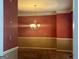 Dining room featuring warm colors, carpet, and a chandelier at 9340 Basswood Way, Jonesboro, GA 30236