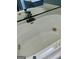 Bathroom with a large white jacuzzi tub and decorative mirror at 9340 Baswood Way, Jonesboro, GA 30236