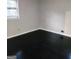 An empty room with dark wood floors at 1217 Dove Ct, Morrow, GA 30260