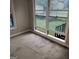 A view from inside a room that looks out onto a yard at 1217 Dove Ct, Morrow, GA 30260