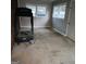An empty room contains a treadmill and worn carpeting at 1217 Dove Ct, Morrow, GA 30260