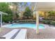 Manicured backyard features in-ground pool, brick patio, landscaping and a shed at 119 Brookgrove Ln, Peachtree City, GA 30269