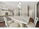 Spacious kitchen island with granite countertops and seating, ideal for entertaining at 119 Brookgrove Ln, Peachtree City, GA 30269