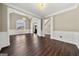 Bright interior featuring hardwood floors, ample lighting, open concept and an elegant staircase at 119 Brookgrove Ln, Peachtree City, GA 30269