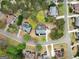 An aerial view shows the well-maintained landscaping and mature trees surrounding this beautiful property at 735 River Ridge Ln, Suwanee, GA 30024