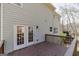 Wooden back deck with railings, offering views from the back of the house at 2032 Stonewick Ct, Lawrenceville, GA 30043