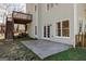 The backyard has a patio and deck connected to the house, as well as stairs to the upper level at 2032 Stonewick Ct, Lawrenceville, GA 30043