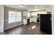 Modern kitchen with white cabinets, stainless steel appliances, and granite countertops at 173 Regency Park Dr, Mcdonough, GA 30253
