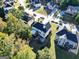 A home featuring a backyard patio and covered area, set in a lush neighborhood at 1721 Telfair Chase Way, Lawrenceville, GA 30043