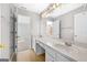 Well-lit bathroom with double sink vanity, providing lots of counter space at 1721 Telfair Chase Way, Lawrenceville, GA 30043