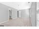 Comfortable bedroom with ample natural light from bright windows at 1721 Telfair Chase Way, Lawrenceville, GA 30043