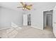 Bedroom with adjoining bathroom and multiple closets at 1721 Telfair Chase Way, Lawrenceville, GA 30043