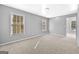 Bedroom with ample natural light and an ensuite bathroom at 1721 Telfair Chase Way, Lawrenceville, GA 30043