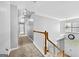 Bright hallway with natural light cascading into foyer below at 1721 Telfair Chase Way, Lawrenceville, GA 30043