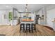 Bright eat-in kitchen with an island, stainless appliances, and breakfast bar at 1721 Telfair Chase Way, Lawrenceville, GA 30043