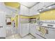 Functional kitchen featuring white cabinets and appliances at 1721 Telfair Chase Way, Lawrenceville, GA 30043