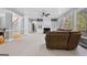 Spacious living room with a fireplace and built-in shelving at 1721 Telfair Chase Way, Lawrenceville, GA 30043