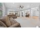 Open concept living area with hardwood floors and bright natural light at 1721 Telfair Chase Way, Lawrenceville, GA 30043