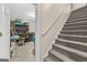 Carpeted staircase leading to additional living space at 1721 Telfair Chase Way, Lawrenceville, GA 30043