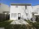 Backyard featuring a concrete patio and a partial view of the home's exterior at 371 Coral Cir, Mcdonough, GA 30253