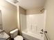 Bathroom featuring a shower-tub combination with a white surround at 371 Coral Cir, Mcdonough, GA 30253