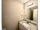 Modern bathroom features granite countertop, white cabinets and a large mirror at 371 Coral Cir, Mcdonough, GA 30253