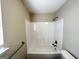 Bathroom featuring a shower-tub combination with a white surround at 371 Coral Cir, Mcdonough, GA 30253