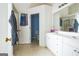 Well-lit bathroom featuring double vanity and a shower-tub combination at 2636 General Lee Ct, Buford, GA 30519