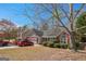 Lovely one-story home with brick and siding, a front yard, and a two-car garage at 2636 General Lee Ct, Buford, GA 30519