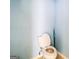 Powder room with toilet and light blue walls at 2636 General Lee Ct, Buford, GA 30519