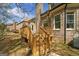 Exterior steps up to the backyard deck attached to a brick house at 5265 Brookhollow Dr, Douglasville, GA 30135