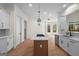 Kitchen view showcasing the island cooktop, stainless steel appliances, and ample counter space at 5265 Brookhollow Dr, Douglasville, GA 30135