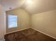 Bedroom with high ceilings, brown carpet and a window at 2940 Highland Hill Pkwy, Douglasville, GA 30135
