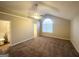 Large main bedroom features vaulted ceilings, ceiling fan, and ample closet space at 2940 Highland Hill Pkwy, Douglasville, GA 30135