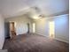 Expansive main bedroom has vaulted ceilings, multiple closets, and ensuite bathroom access at 2940 Highland Hill Pkwy, Douglasville, GA 30135