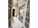 Modern bathroom with a standalone tub, frameless shower, and stylish fixtures and tile at 5860 Fairway View Dr, Suwanee, GA 30024