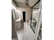 Elegant bathroom featuring double sinks, a standalone tub, a frameless shower, and modern fixtures at 5860 Fairway View Dr, Suwanee, GA 30024