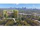 Beautiful brick house nestled amongst the trees, overlooking a scenic cityscape at 619 E Pelham Ne Rd, Atlanta, GA 30324