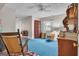 Cozy basement area with unique furniture, and a vibrant blue carpet at 619 E Pelham Ne Rd, Atlanta, GA 30324