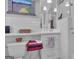 Clean bathroom with white subway tile walls and bright lighting at 619 E Pelham Ne Rd, Atlanta, GA 30324
