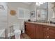 Bathroom features a vanity with marble countertops and tile flooring at 619 E Pelham Ne Rd, Atlanta, GA 30324