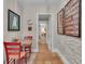 View of a dining area featuring rustic tile flooring and doorway views to adjoining rooms at 619 E Pelham Ne Rd, Atlanta, GA 30324