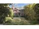 Charming brick home with a manicured lawn and mature landscaping at 619 E Pelham Ne Rd, Atlanta, GA 30324