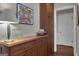 Hallway with built-in wooden cabinetry and ample storage space at 619 E Pelham Ne Rd, Atlanta, GA 30324