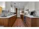 Updated kitchen with white cabinets, marble backsplash, and wooden floors at 619 E Pelham Ne Rd, Atlanta, GA 30324