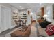 Comfortable living space with a rustic table and chairs, flowing into the kitchen area at 619 E Pelham Ne Rd, Atlanta, GA 30324