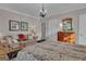 Bright main bedroom featuring a comfortable couch, a decorative mirror, and an elegant chandelier at 619 E Pelham Ne Rd, Atlanta, GA 30324