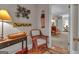 Sitting area features terra cotta floors and doorway views to adjoining rooms at 619 E Pelham Ne Rd, Atlanta, GA 30324