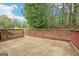 Outdoor area with greenery is perfect for backyard gatherings and relaxation at 909 Chapman Cir, Stone Mountain, GA 30088